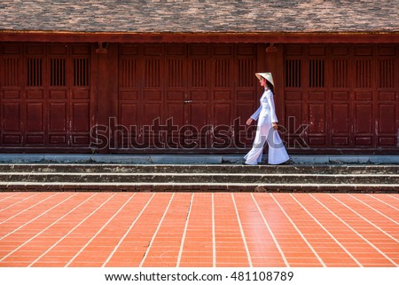 vietnam girl walk in Thien Mu temple hue town
