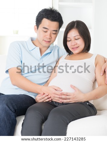 http://thumb7.shutterstock.com/display_pic_with_logo/71884/227143285/stock-photo-asian-couple-husband-and-months-pregnant-wife-227143285.jpg