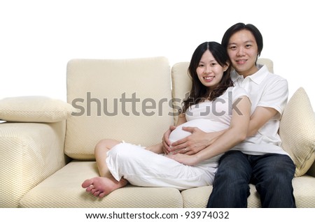 https://thumb7.shutterstock.com/display_pic_with_logo/71884/71884,1328003644,1/stock-photo-asian-couple-husband-and-months-pregnant-wife-sitting-on-sofa-93974032.jpg
