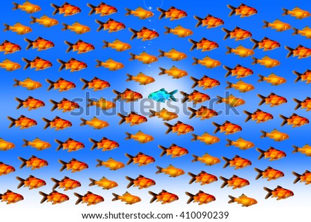 stock-photo-golden-fish-swim-against-the-current-having-the-power-to-say-no-410090239.jpg