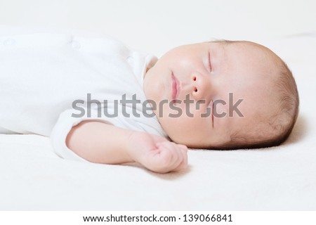 detail of cute month old baby sleeping