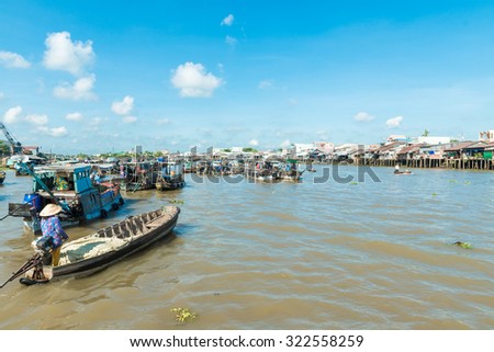 MEKONG DELTA, VIETNAM - April 25, 2014 - Asian floating market on Mekong river in Vietnam