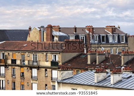 Roof Tops With Chimneys Stock Images, Royalty-Free Images ... Old apartment buildings downtown Paris at sunset