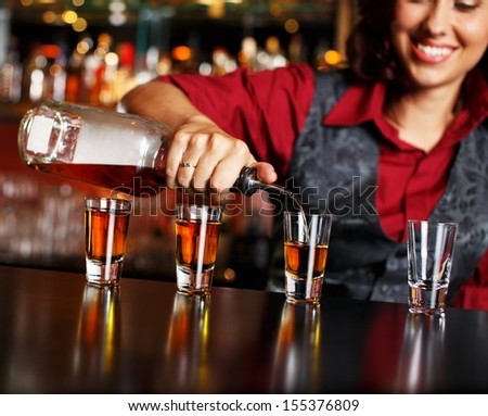 Redhead bar tender in corset Keystone bantam league midget football