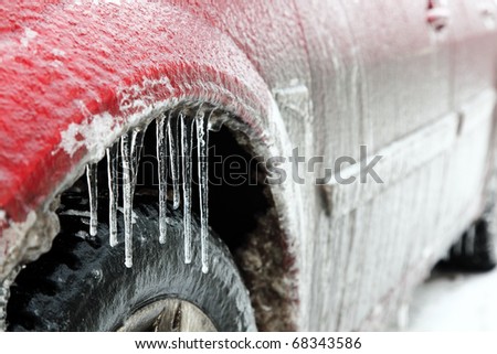 stock-photo-extreme-winter-series-car-in-ice-icicles-on-a-wheel-arch-close-up-68343586.jpg