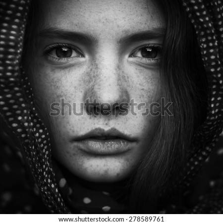 Black and white portrait of a beautiful girl with freckles Black and white portrait of a beautiful girl with freckles
