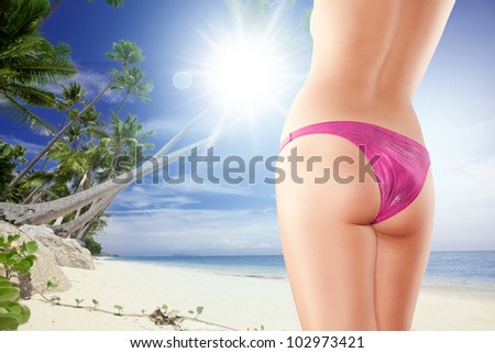 Close up view of nice smooth woman�s legs on color back