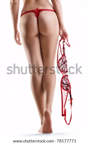 Close up view of nice smooth woman’s legs on white back