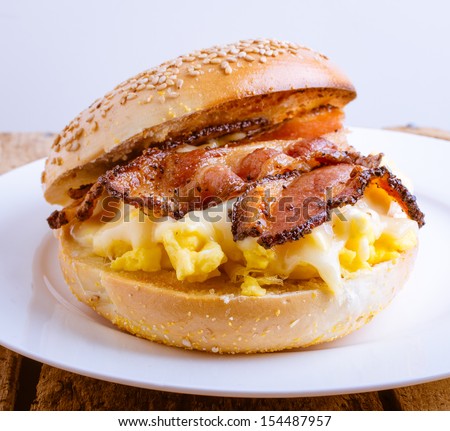 Bagel breakfast sandwich with bacon egg and cheese by Edward M. Fielding
