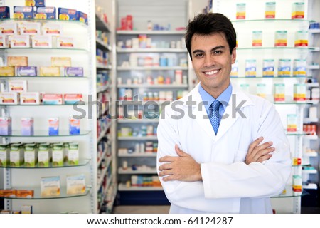 small business owner: portrait of a male pharmacist at pharmacy