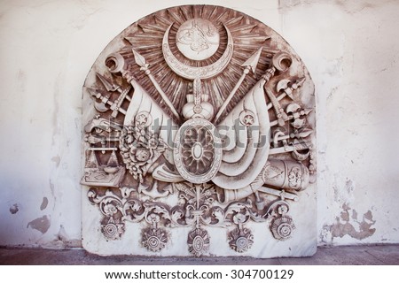 stock-photo-vintage-bas-relief-with-coat