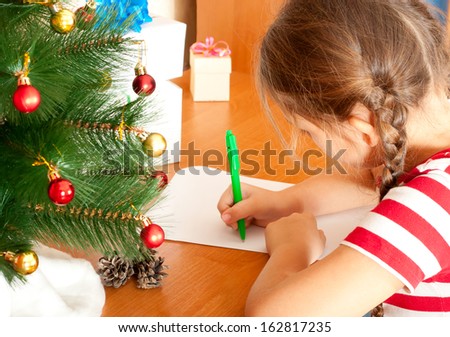 child write a letter to Santa Claus