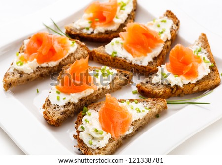 Bread with smoked salmon and cream cheese - stock photo
