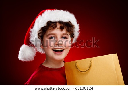 Christmas time - boy with Santa Claus Hat