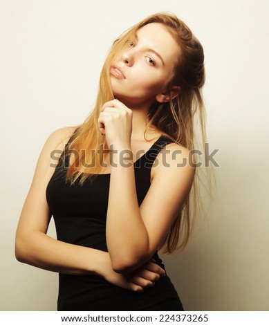 https://thumb7.shutterstock.com/display_pic_with_logo/81677/224373265/stock-photo-beautiful-woman-with-long-blond-hair-fashion-model-posing-at-studio-224373265.jpg