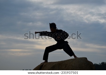  Silhouette Young Boy Performing Pencak Silat Stock Photo 