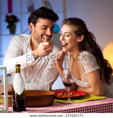 https://thumb7.shutterstock.com/display_pic_with_logo/82929/219585175/stock-photo-romantic-couple-having-dinner-at-home-219585175.jpg