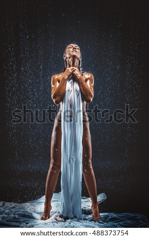 Woman in the rain nude beauty
