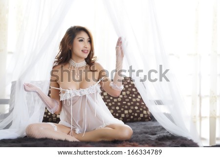 https://thumb7.shutterstock.com/display_pic_with_logo/847702/166334789/stock-photo-beautiful-asian-woman-in-sexy-lingerie-in-bedroom-166334789.jpg