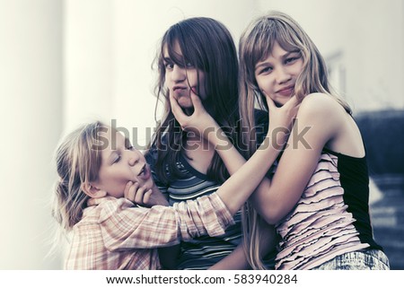 Group Of Happy Teen Girls On City Street Stylish Fashion Model Outdoor Group Of Happy Teen Girls On City Street Stylish Fashion Model Outdoor