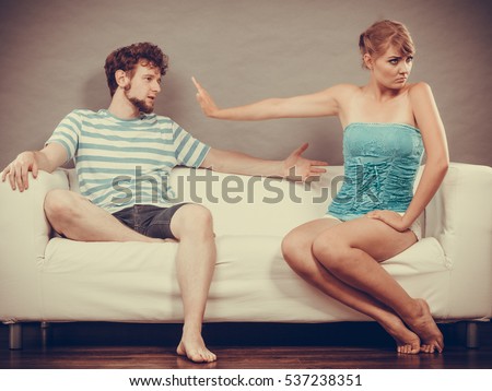 https://thumb7.shutterstock.com/display_pic_with_logo/854650/537238351/stock-photo-bad-relationship-concept-man-and-woman-in-disagreement-young-couple-sitting-on-couch-at-home-537238351.jpg