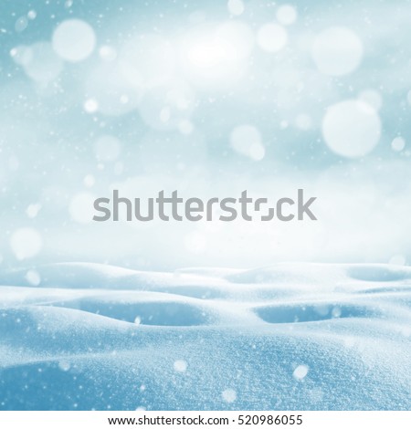 Winter background. Winter bright landscape with snowdrifts and falling snow.