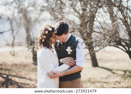 https://thumb7.shutterstock.com/display_pic_with_logo/86802/273921479/stock-photo-beautiful-wedding-couple-hugging-and-kissing-outdoors-in-spring-sunny-park-wedding-couple-in-love-273921479.jpg