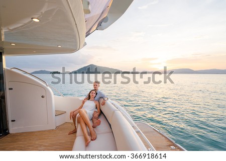 https://thumb7.shutterstock.com/display_pic_with_logo/871054/366918614/stock-photo-romantic-vacation-and-luxury-travel-young-loving-couple-sitting-on-the-sofa-on-the-modern-yacht-366918614.jpg