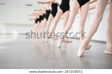 legs of young dancers ballerinas in class classical dance, ballet