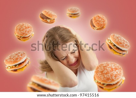 stock-photo-diet-concept-frightened-girl-in-the-stress-and-flying-around-the-burgers-on-a-red-background-97415516.jpg