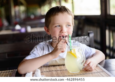 Boy Drinking Orange Juice Stock Photo 107827190 - Shutterstock