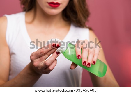 Image result for woman using toner on her face