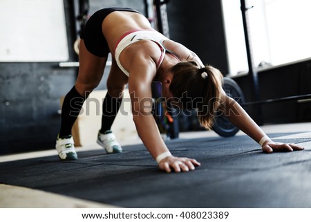Exercising in gym