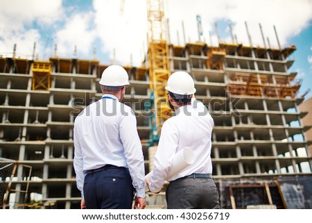 Backs of architects