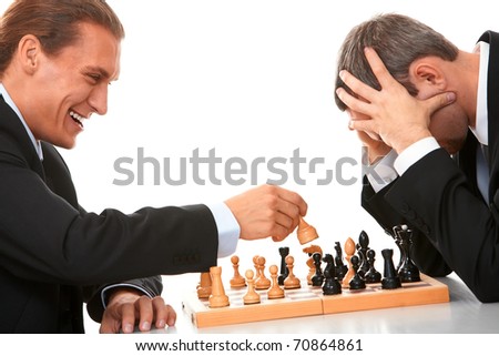 Image of businessmen playing in chess