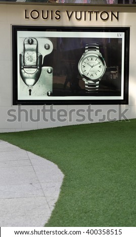 KUALA LUMPUR, MALAYSIA - March 31, 2016. Louis Vuitton advertising board display on wall in Kuala Lumpur. Louis Vuitton is a France luxury leather goods company. Founded in Paris, France since 1854.