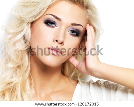 https://thumb7.shutterstock.com/display_pic_with_logo/93178/120172315/stock-photo-beautiful-blond-woman-with-long-curly-hair-and-style-makeup-girl-posing-on-white-background-120172315.jpg