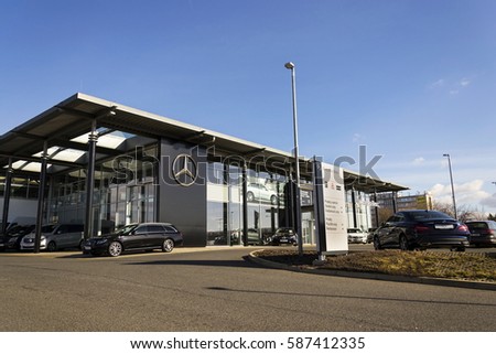 PRAGUE, CZECH REPUBLIC - FEBRUARY 25: Mercedes-Benz car logo on dealership building on February 25, 2017 in Prague, Czech republic. Daimler does deal with Uber on autonomous vehicles fleet.