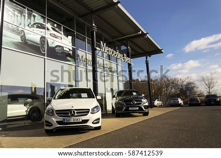 PRAGUE, CZECH REPUBLIC - FEBRUARY 25: Mercedes-Benz car logo on dealership building on February 25, 2017 in Prague, Czech republic. Daimler does deal with Uber on autonomous vehicles fleet.