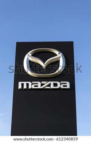 PRAGUE, CZECH REPUBLIC - MARCH 31: Mazda car company logo in front of dealership building on March 31, 2017 in Prague, Czech republic. Mazda set to launch new electric vehicle range by 2019.