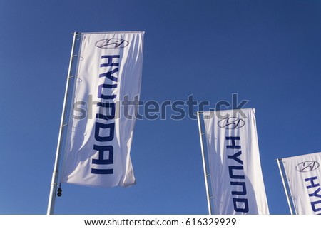 PRAGUE, CZECH REPUBLIC - MARCH 31: Hyundai company logo in front of dealership building on November 7, 2016 in Prague, Czech republic. Hyundai plans new platform for long range EVs and Genesis.
