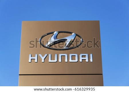 PRAGUE, CZECH REPUBLIC - MARCH 31: Hyundai company logo in front of dealership building on November 7, 2016 in Prague, Czech republic. Hyundai plans new platform for long range EVs and Genesis.
