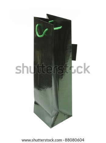 green sparkling gift bag with handle on a white background