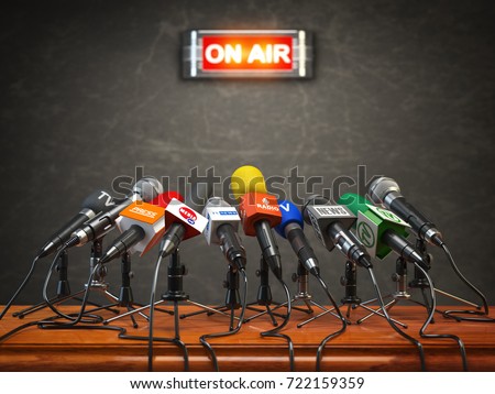 Press conference or interview on air. Microphones of different mass media, radio, tv and press prepared for conference meeting. 3d illustration.