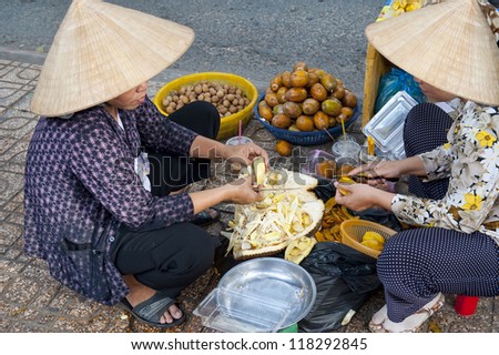 Women Selling Fruit on the streets of Ho Chi Minh City in Saigon
