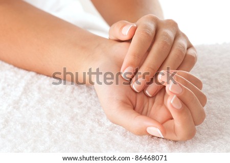 Beautiful hands on the white towel