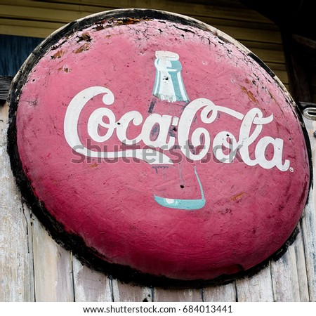 Spring TX USA - July 12, 2017 - Old Rusted CocaCola Sign in Old Town Spring