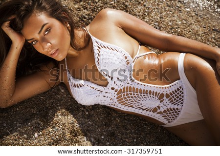 https://thumb7.shutterstock.com/display_pic_with_logo/974815/317359751/stock-photo-fashion-outdoor-photo-of-sexy-beautiful-woman-with-long-hair-in-elegant-white-bikini-with-317359751.jpg