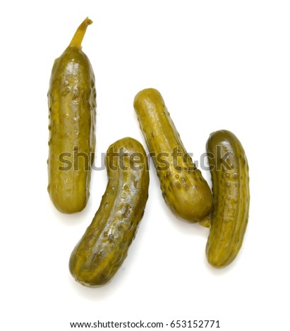 Fresh sliced green pickles isolated over white 