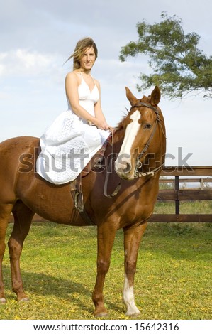 stock-photo-a-young-woman-in-a-white-dress-sitting-side-saddle-on-a-horse-450w-15642316.jpg
